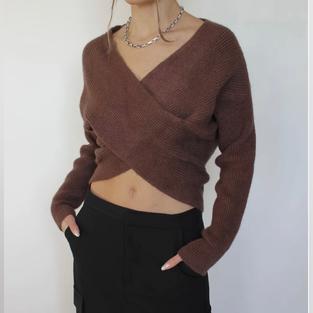 Brown ribbed criss cross sweater. No Tags.